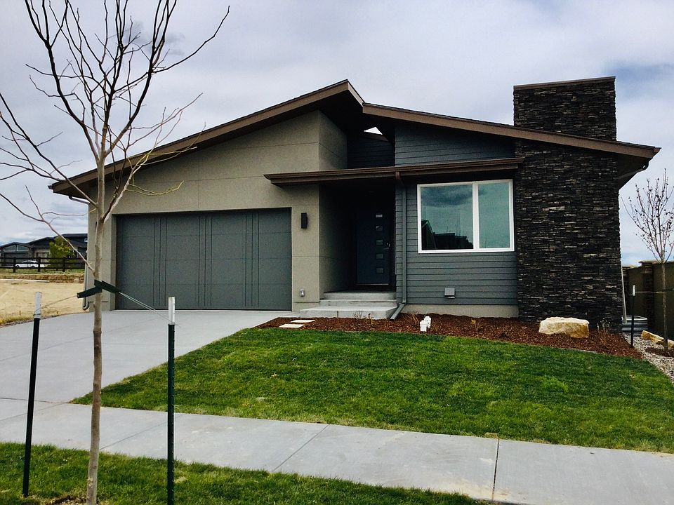 Exterior with landscaping.