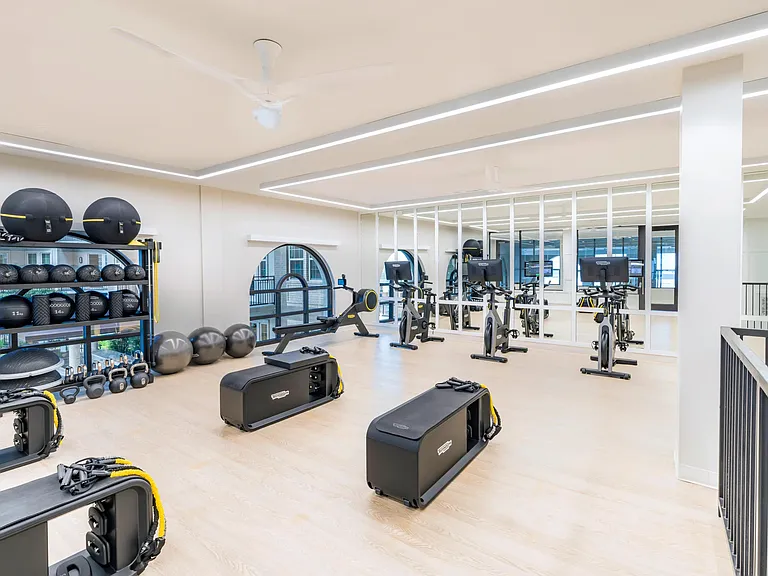Elevate your fitness routine at Modera Waugh's HIIT-inspired fitness studio! Push your limits with state-of-the-art equipment and a dynamic space designed to fuel your energy and focus.