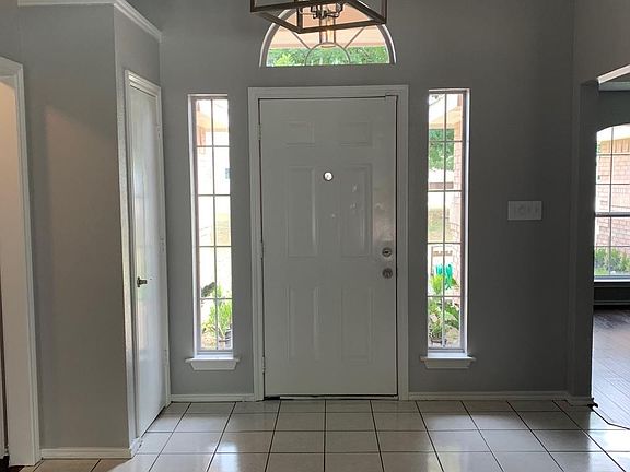 Generous sized interior foyer that leads to dining room and living room
