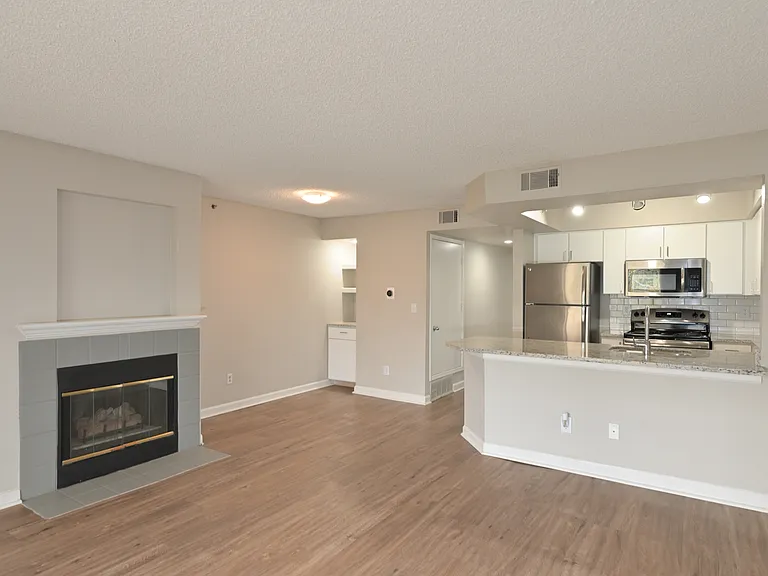 Spacious living space includes a fireplace
