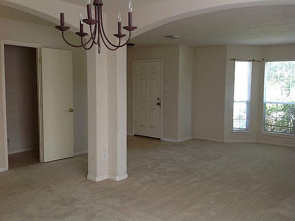 FROM THE DINING ROOM YOU CAN SEE ON LEFT IS THE GUEST HALF BATH, ENTRYWAY AND FORMAL LIVING ROOM TO THE RIGHT