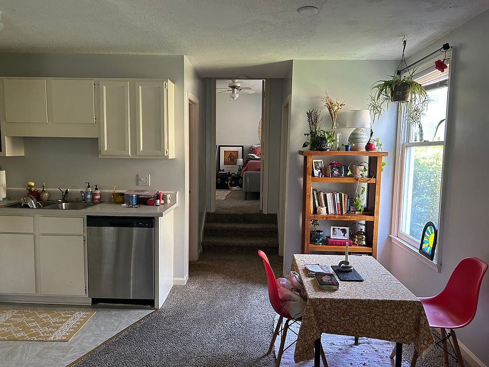 View into bedroom, downstairs is a finished basement area.