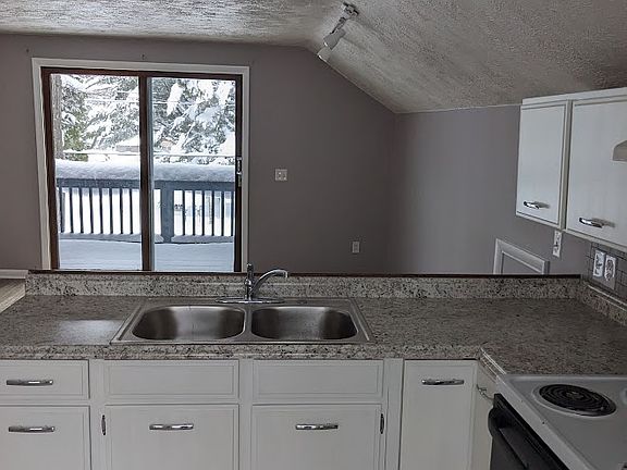 Kitchen looking into the living room.