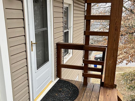 Front entrance with porch light.