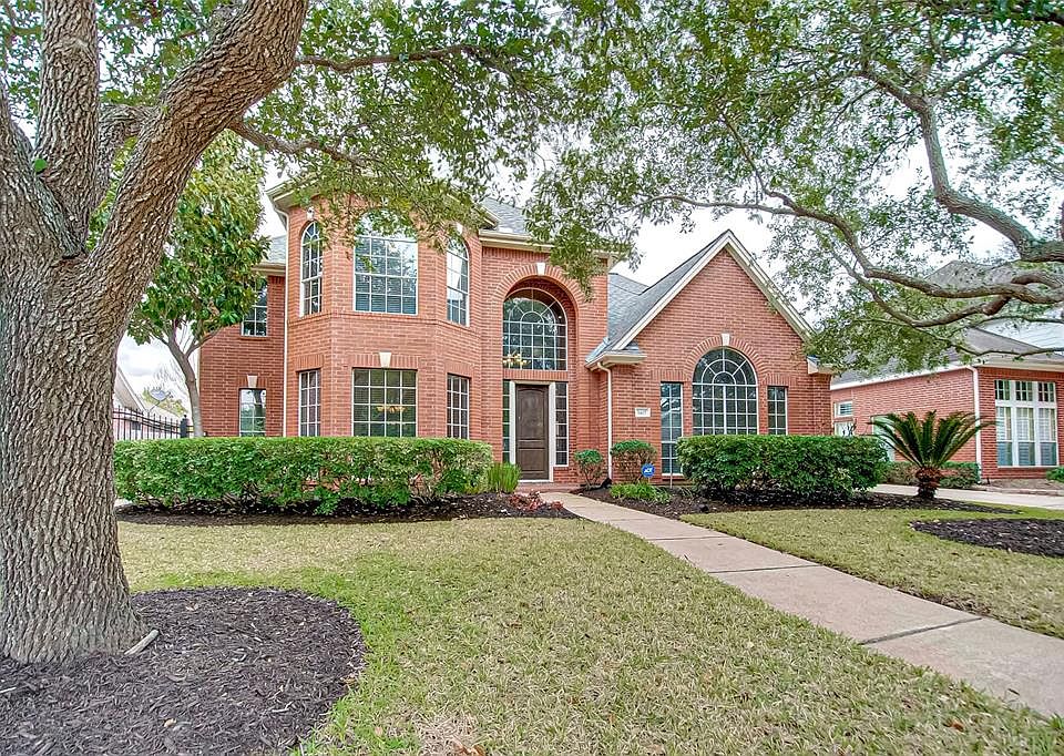 1407 Clarkdale Ct in Green Trails, with lots of mature trees, parks and walking trails