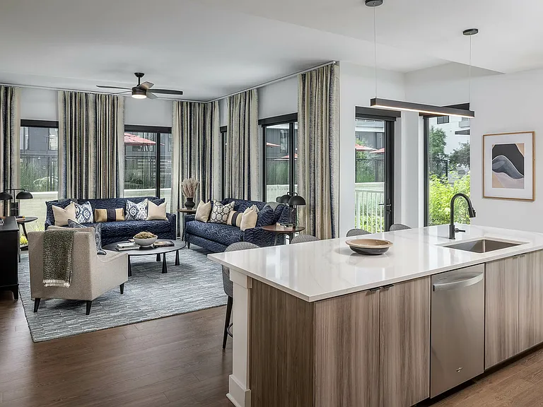 Open floorplan living rooms with Kember wood-style floors