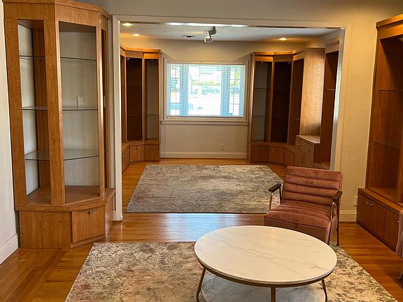 Open floor plan looking from bedroom into living room