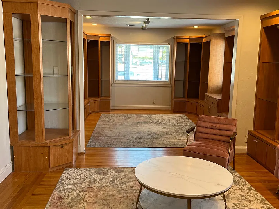 Open floor plan looking from bedroom into living room