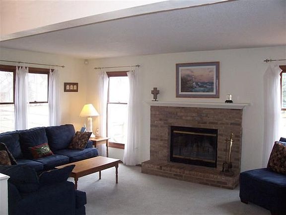 Family Room w/ Woodburning Fireplace