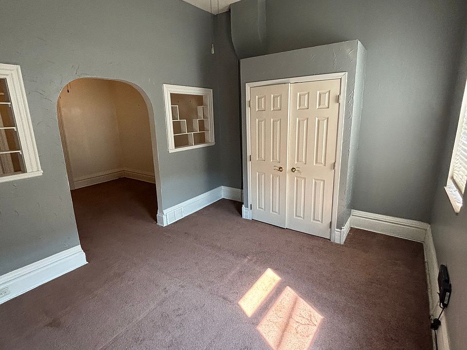 Front of apartment, bedroom.