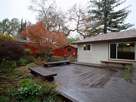 Backyard with deck, patio and shed