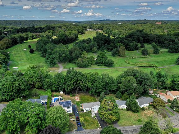 Backs up to the 13th tee