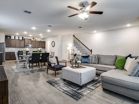 Spacious living room with ample seating.