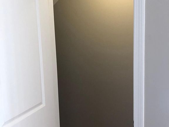 Upstairs closet/ could be used for small office 