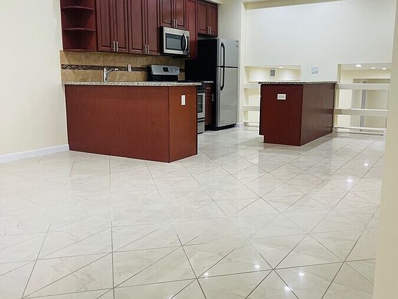 2nd image of 1554 59th St #3B