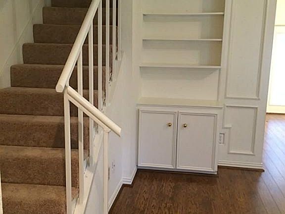 Walk in to see beautiful built-ins, new flooring...