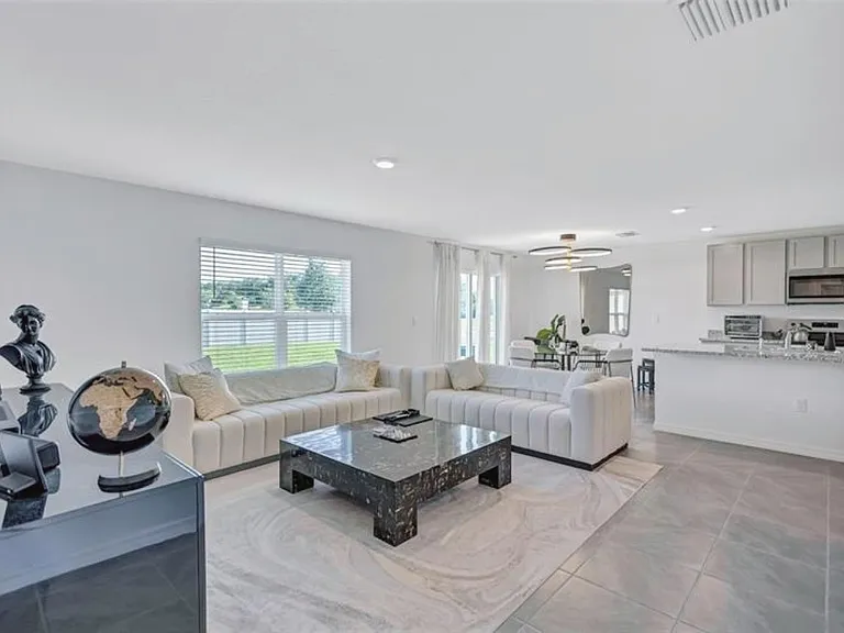 7601 Rosewood Garden Loop — Photo 4
