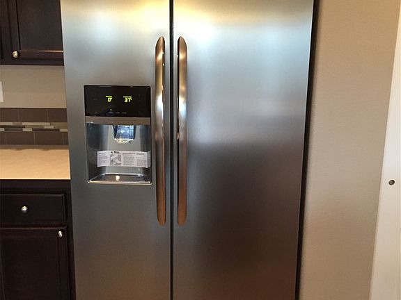 Side by Side Fridge, brand new