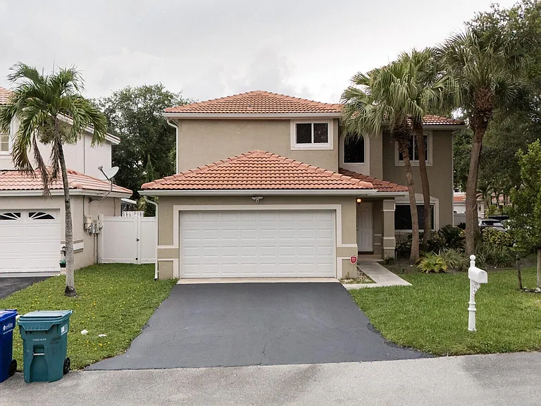 7251 NW 24th Ct — Photo 1