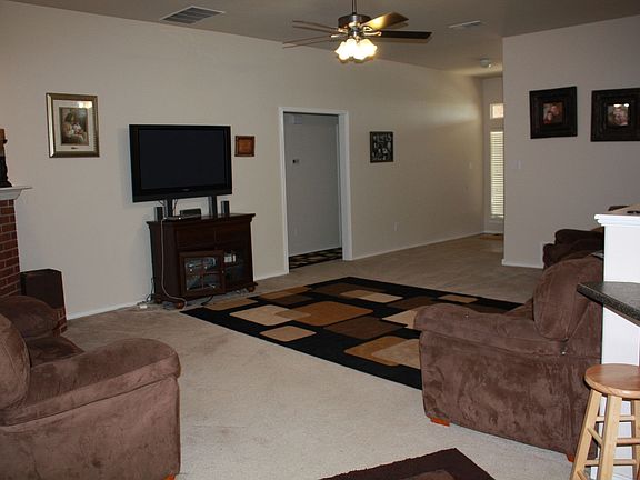 Living room looking towards the front entry way and hall