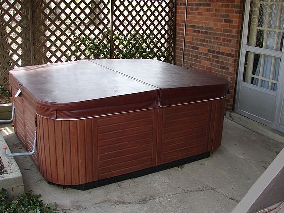 Covered patio is ideal for hot tub