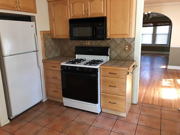 Kitchen range and fridge view 