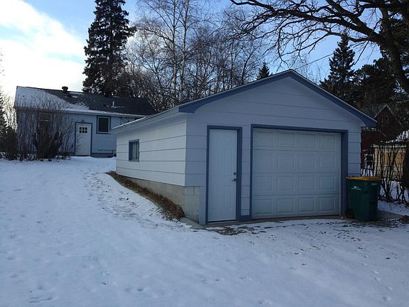 One stall garage with automatic garage door opener off the a
