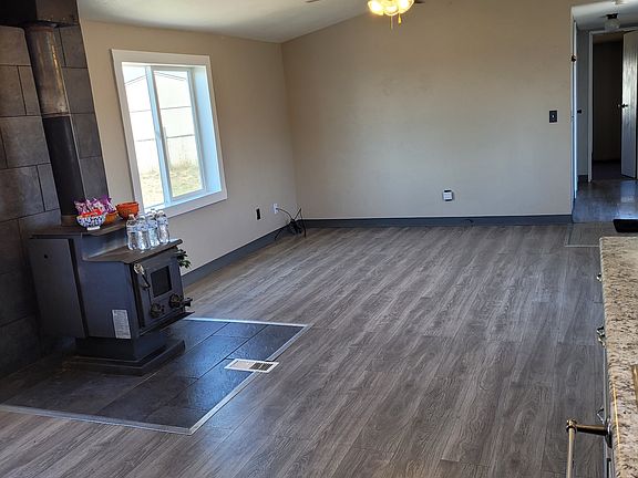 Livingroom with woodburning fireplace
