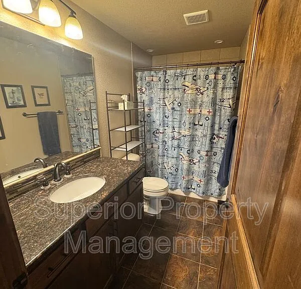 6515 Laramie St — Photo 17