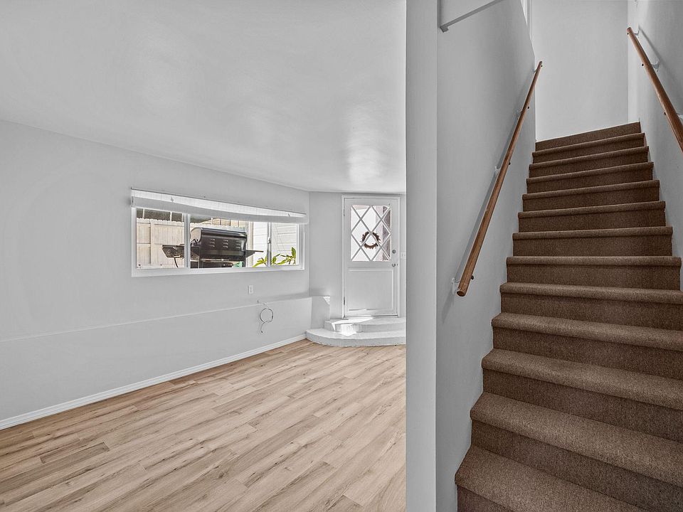 Living room opposite angle and staircase