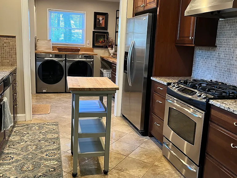 Laundry area with new samsung washer/dryer