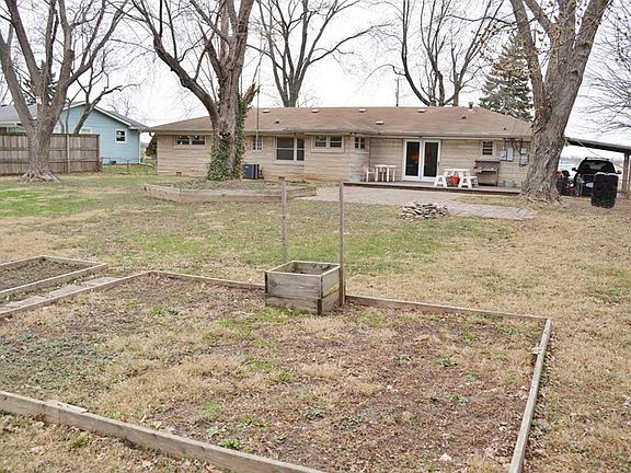 Huge fenced backyard with something for everyone's fun list. Cookouts, gardening & lots of other play room.