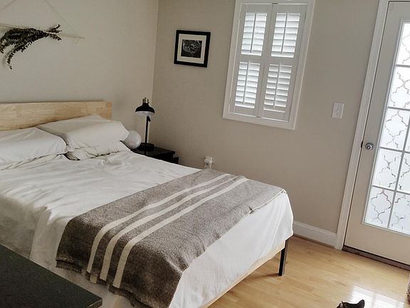 Master bedroom with private deck and walk-in closet