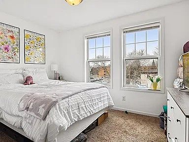 1 of 4 bedrooms with ample light, space and closets