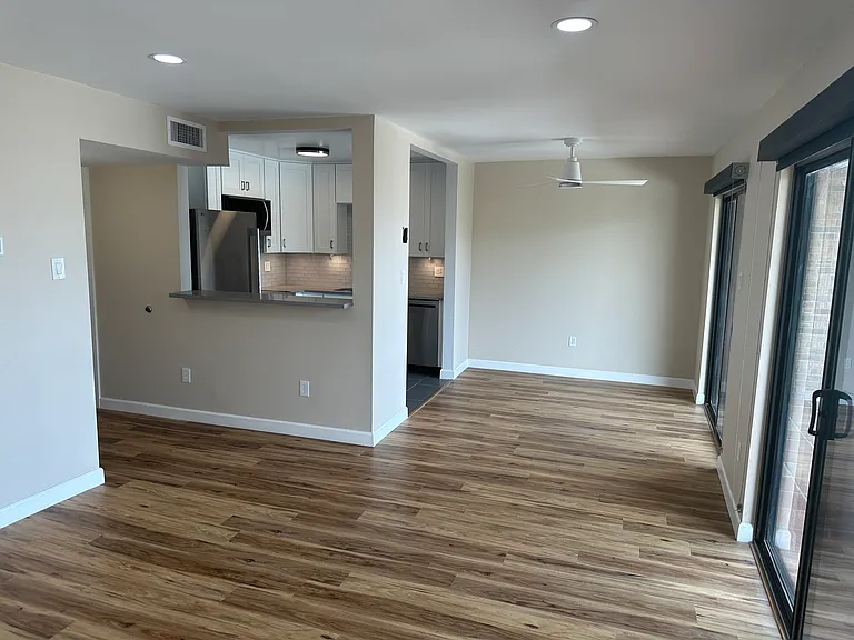 View of kitchen and dining room from living room