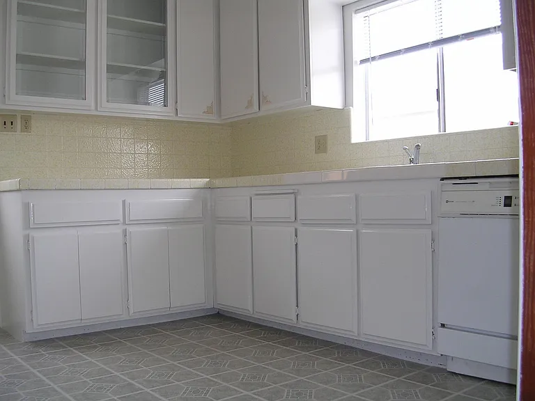 Extra Storage in Kitchen. Newer Blinds and New Kitchen Faucet.