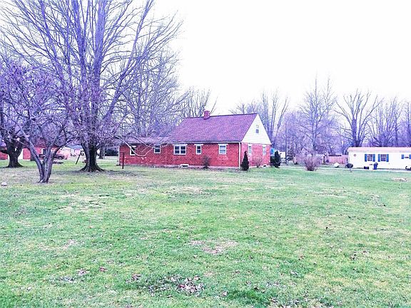 Back of home showing back yard