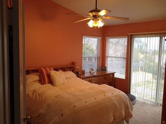 master bedroom, vaulted ceiling and balcony
