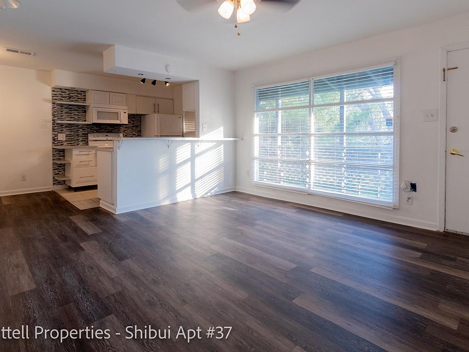 View of the living, dining, and kitchen areas