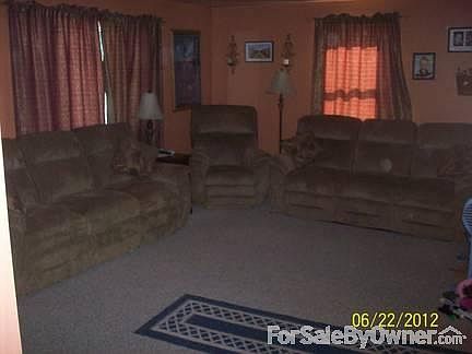 living room measures 17x13
						:
						big picture window with new carpet.