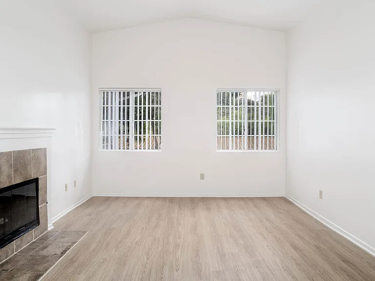 Living Room with Fireplace and Hard Surface Flooring