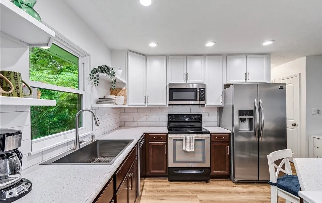 Updated 2BR Duplex with Garage, Rec Room & Balcony — Photo 1