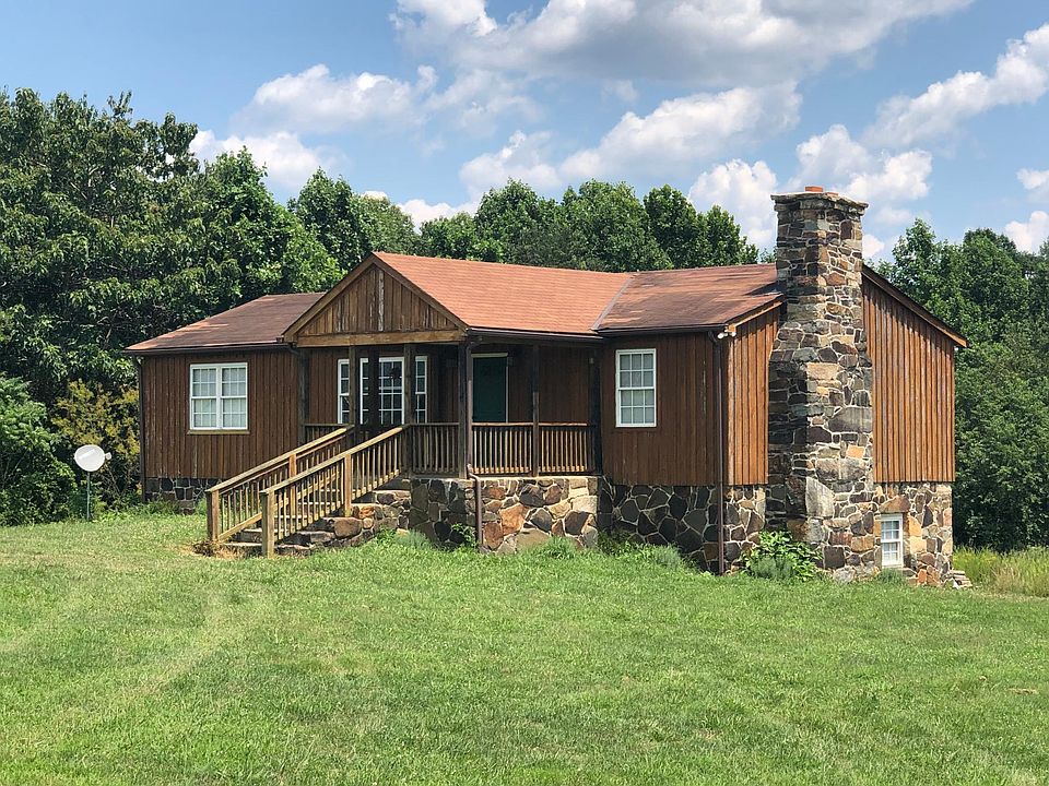 Front view of the home, stonework is all custom, front porch is 13 ' X 12"