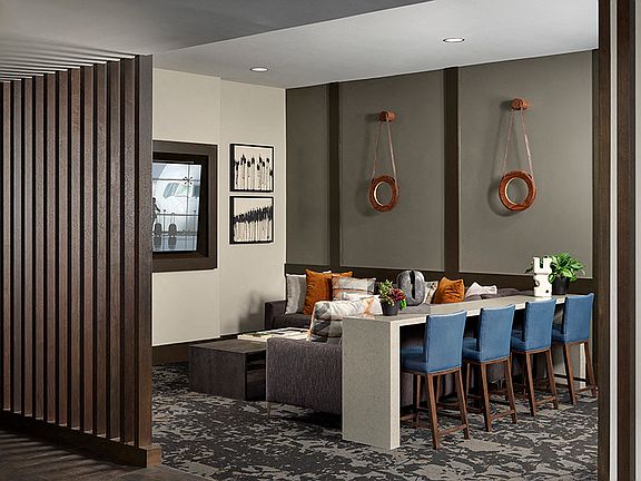 Billiards, TVs, and seating in the resident lounge