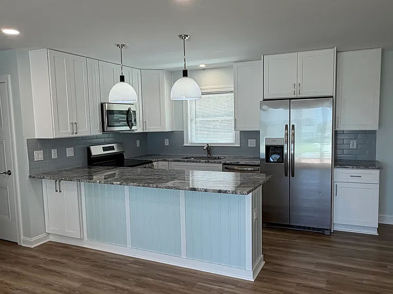 Brand new modern kitchen and appliances.
