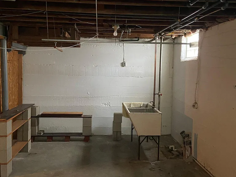 Dry basement with laundry connections.