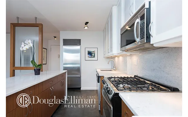 Sold by Douglas Elliman | media 18