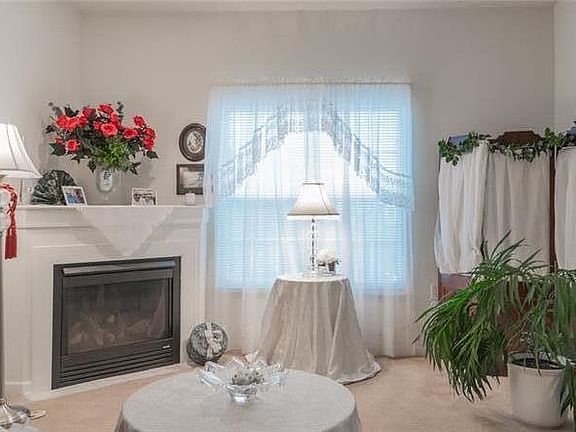 Living room with gas fire place.