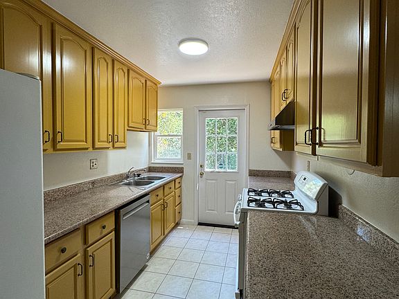 Kitchen with access to backyard