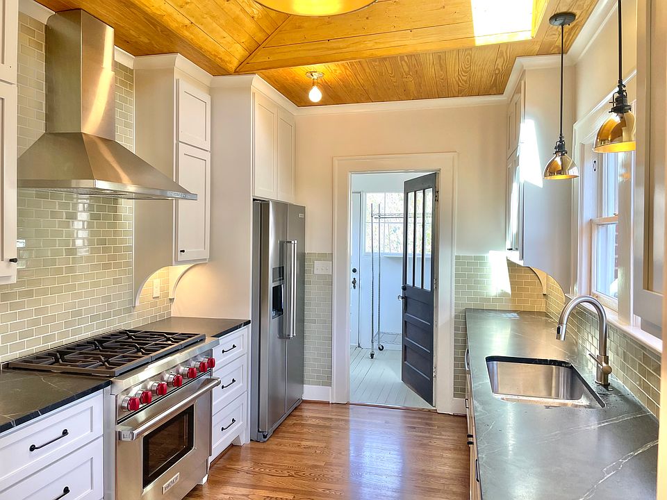Kitchen Wolf 36" 6 burner gas stove, KitchenAid side by Side, Bosh dishwasher, Best quiet range exhaust.